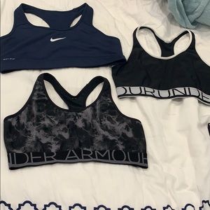 3 women’s Under Armour and Nike Sports bras